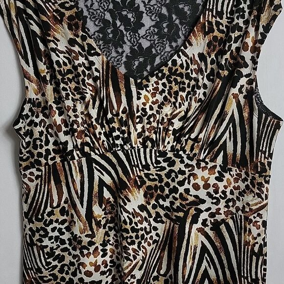 💙5/$20💙 SLIMPACT.. leopard print top.. - Picture 3 of 13